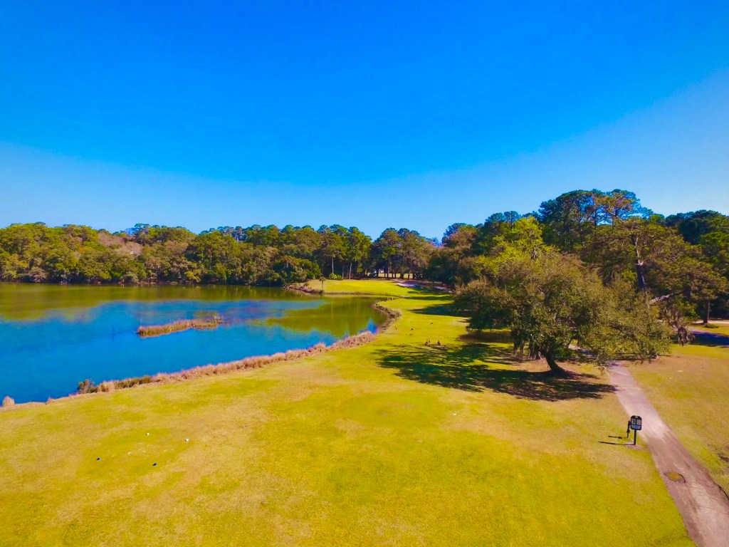 Path on golf course with pond